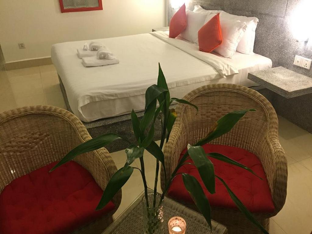 K9 Riverside Hotel Phnom Penh Rum bild
